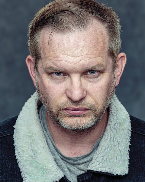 Phil Gwilliam in a shearling-collar denim jacket